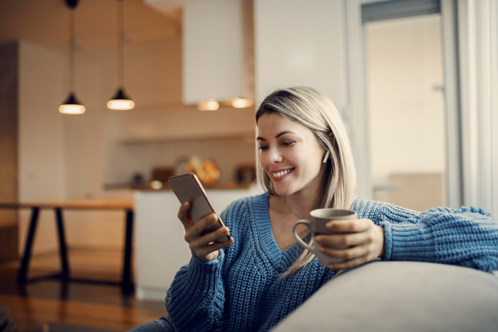 woman researching pcos treatment options on her phone