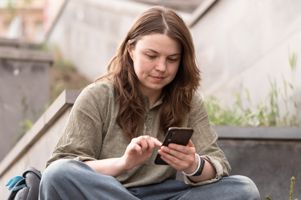 woman scrolling through tiktok