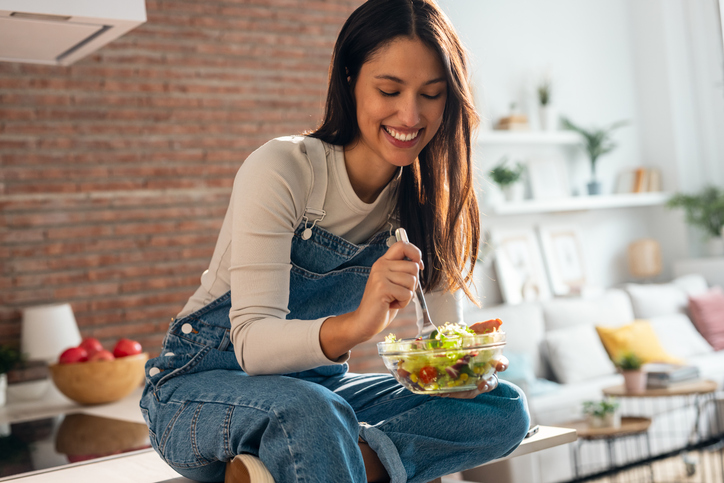 woman eating a salad