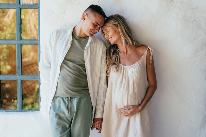 pregnant couple reflecting on egg donation