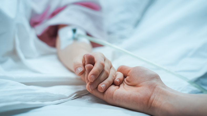 woman being treated in the hospital for miscarriage