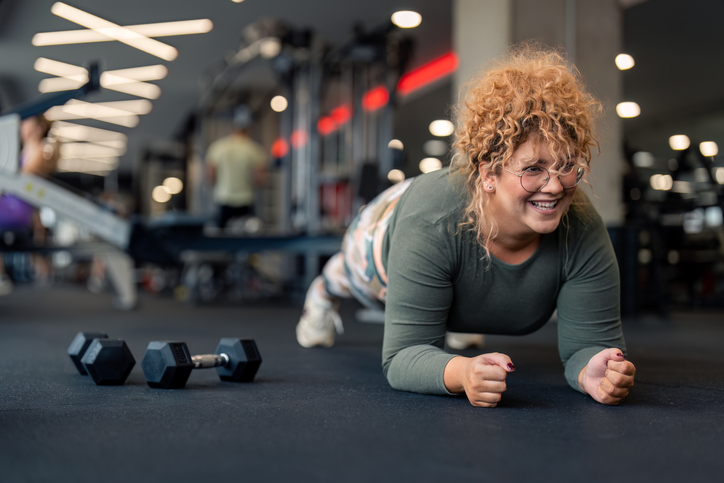 woman doing strength training at the gym