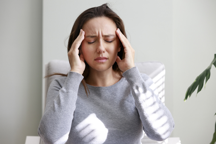 woman suffering from a migraine
