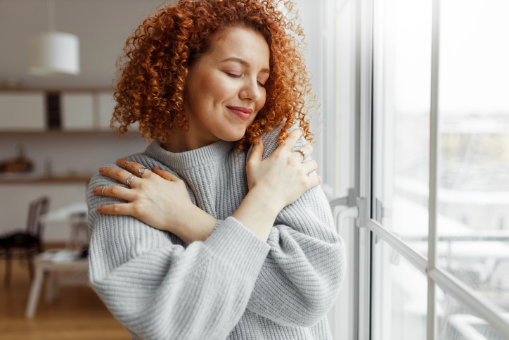 woman embracing herself