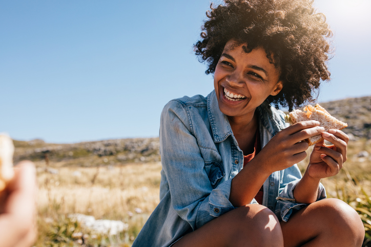woman picnicking outside
