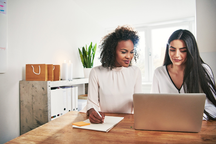 two women looking at an eggbank site