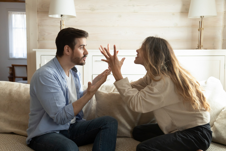 woman screaming at her husband in a fit of perimenopausal rage