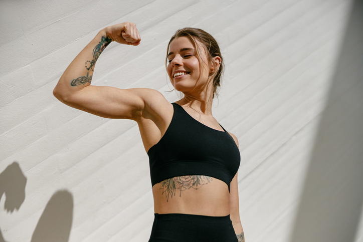 woman flexing her bicep
