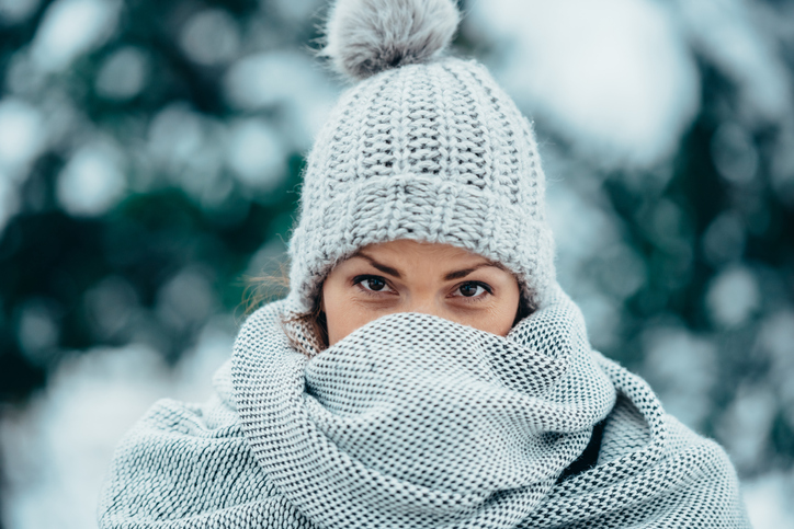 woman bundled up in the snow