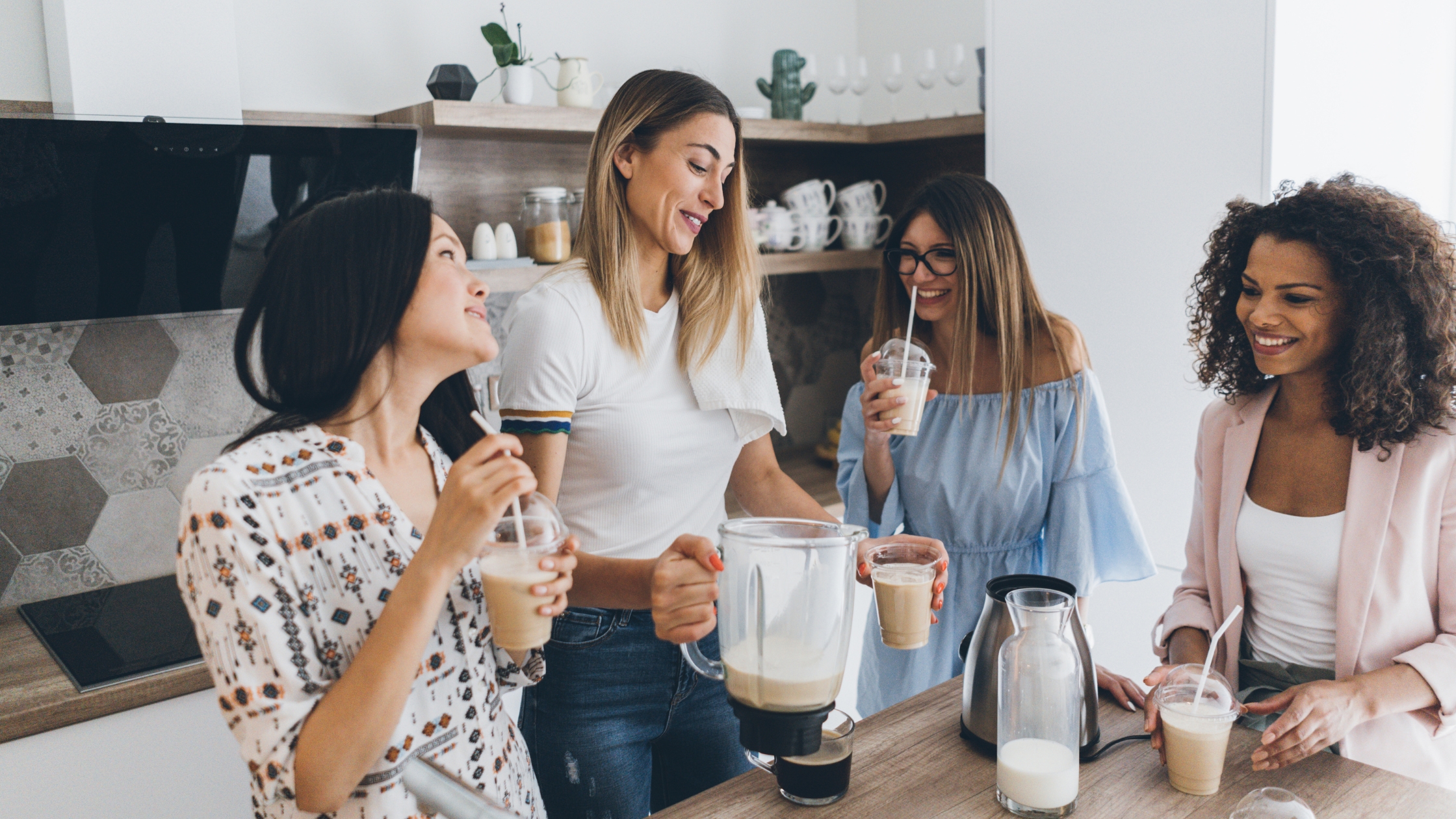 group of women blending mudslides together