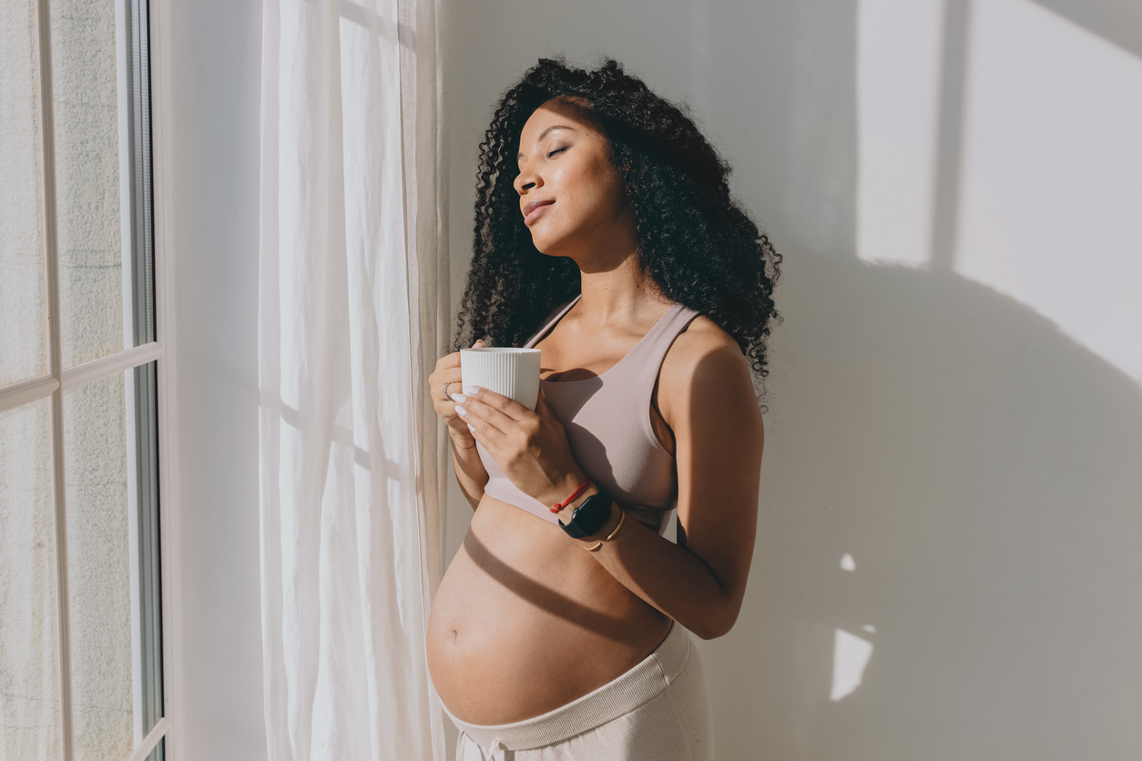 pregnant woman content with her decision about amniocentesis vs. cvs