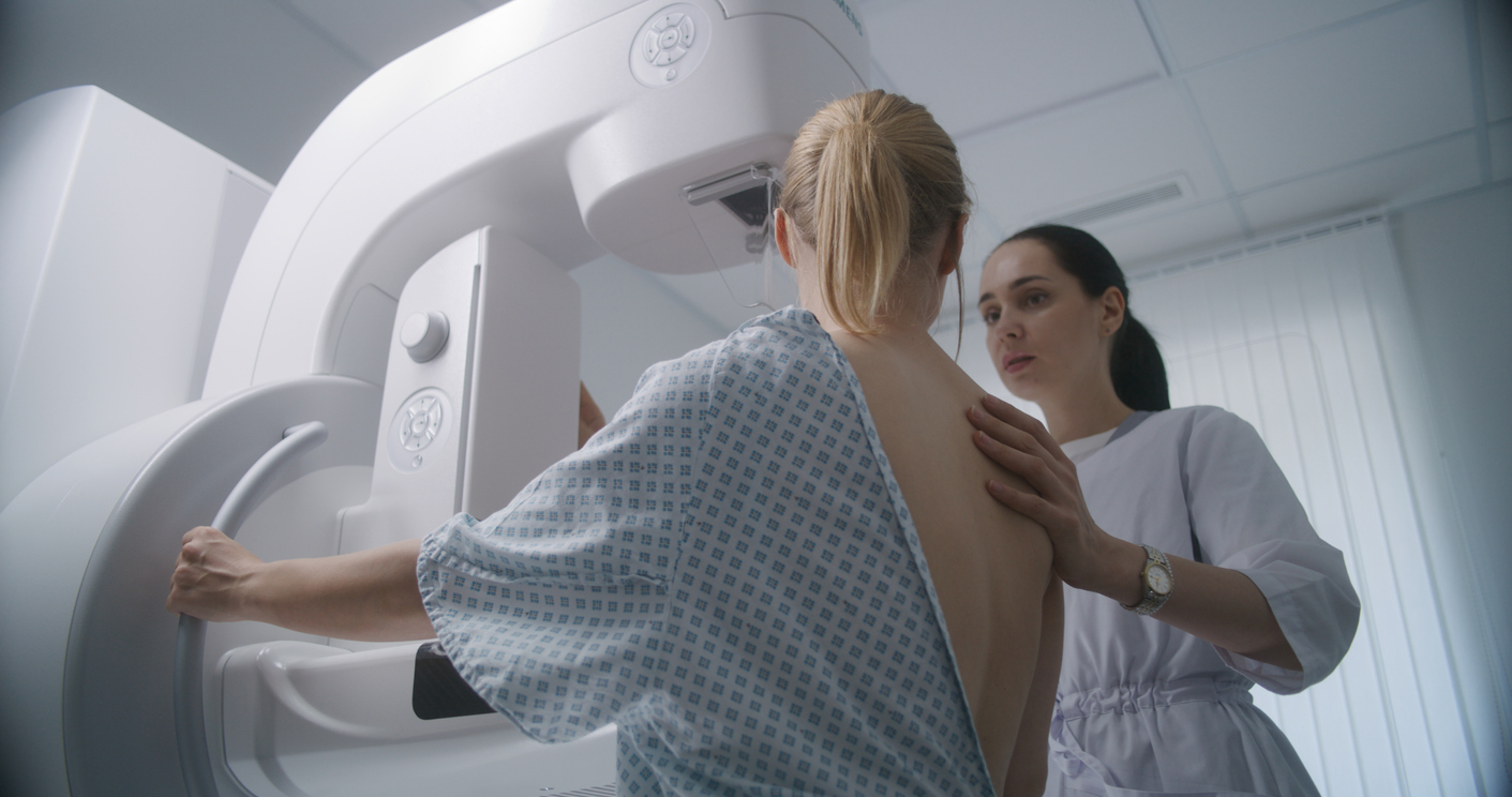 woman getting a mammogram