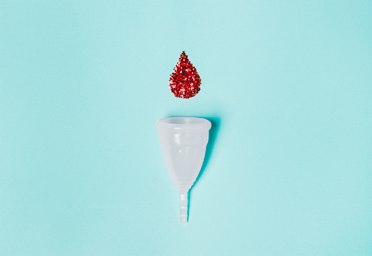drop of blood going into a menstrual cup