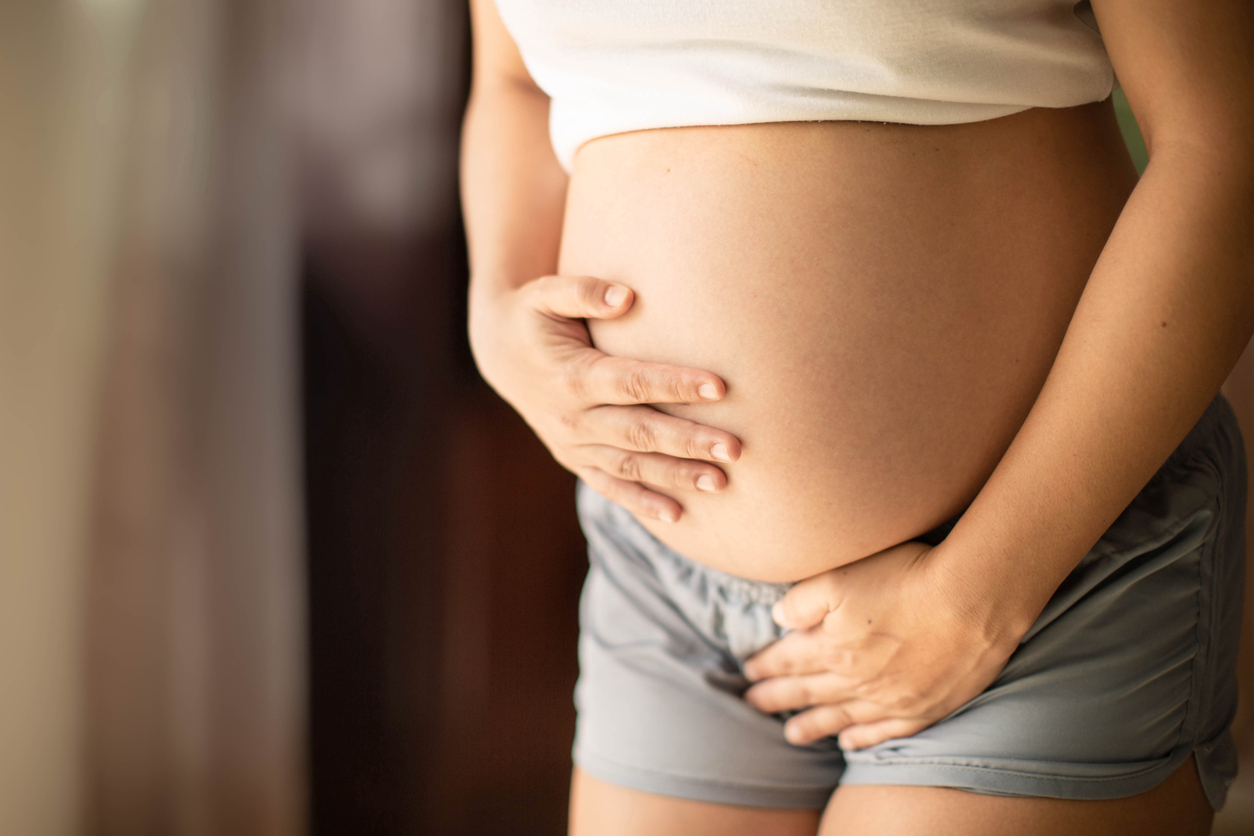woman worried that painful sex could lead to miscarriage