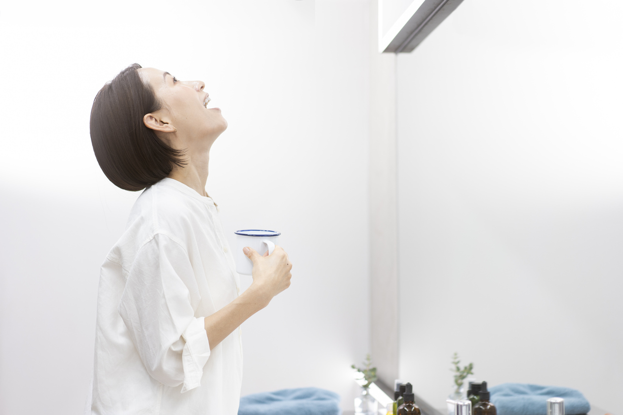 pregnant woman finding relief from excessive coughing