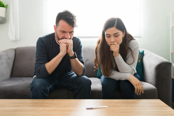 couple waiting for results of their pregnancy test