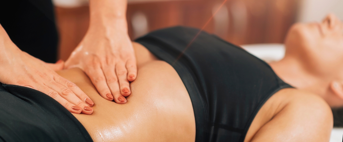 woman getting a castor oil massage to aid fertility