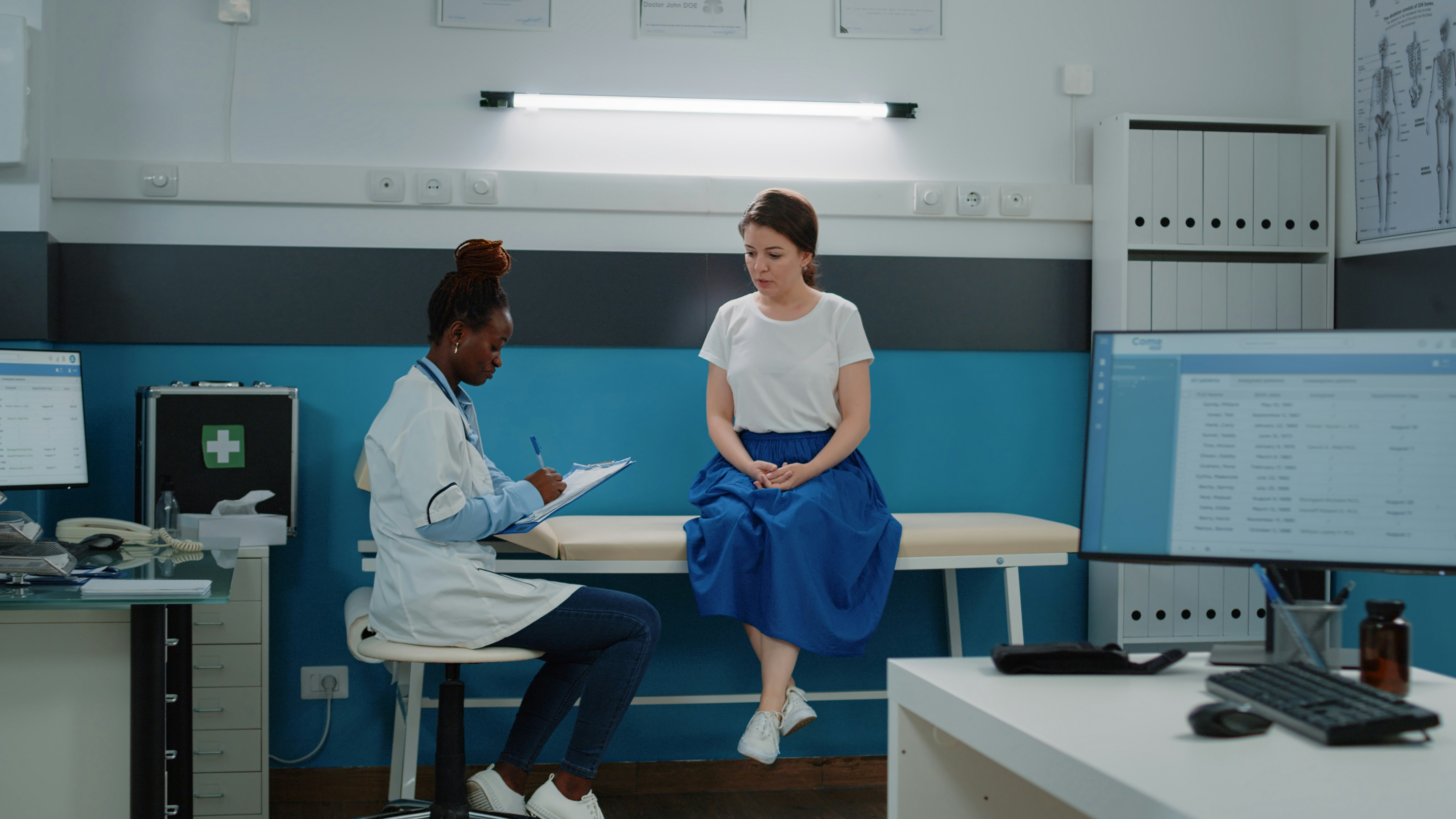 woman in a doctor's office preparing for an endometriosis biopsy