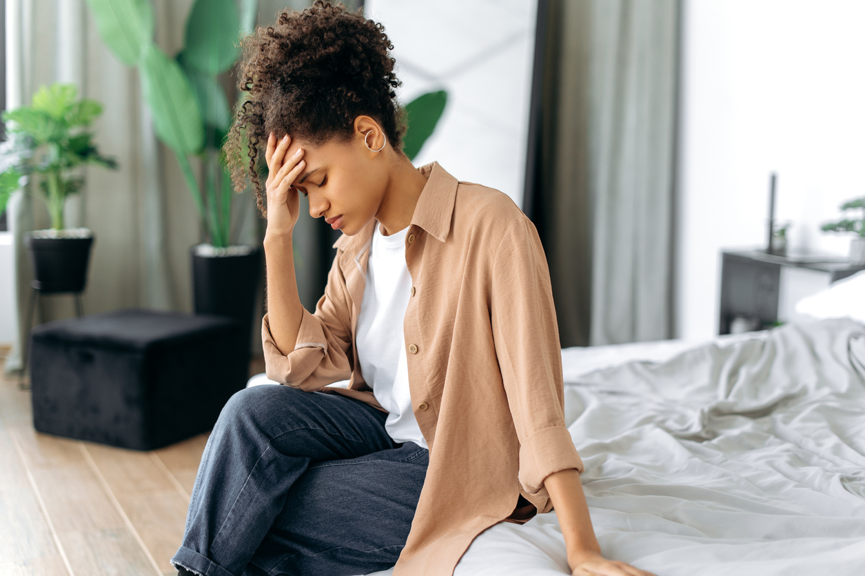 woman in the midst of a migraine