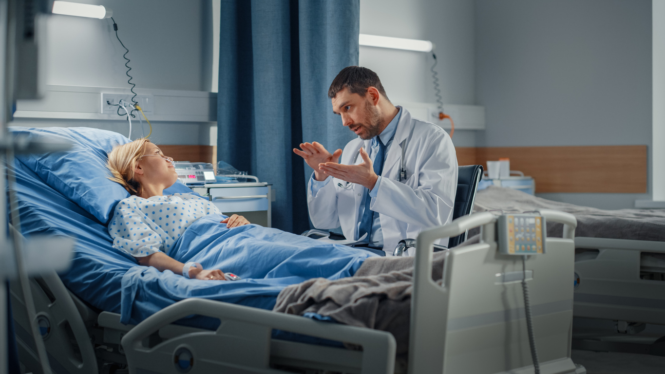 doctor running through the treatment plan for hydrosalpinx with his patient