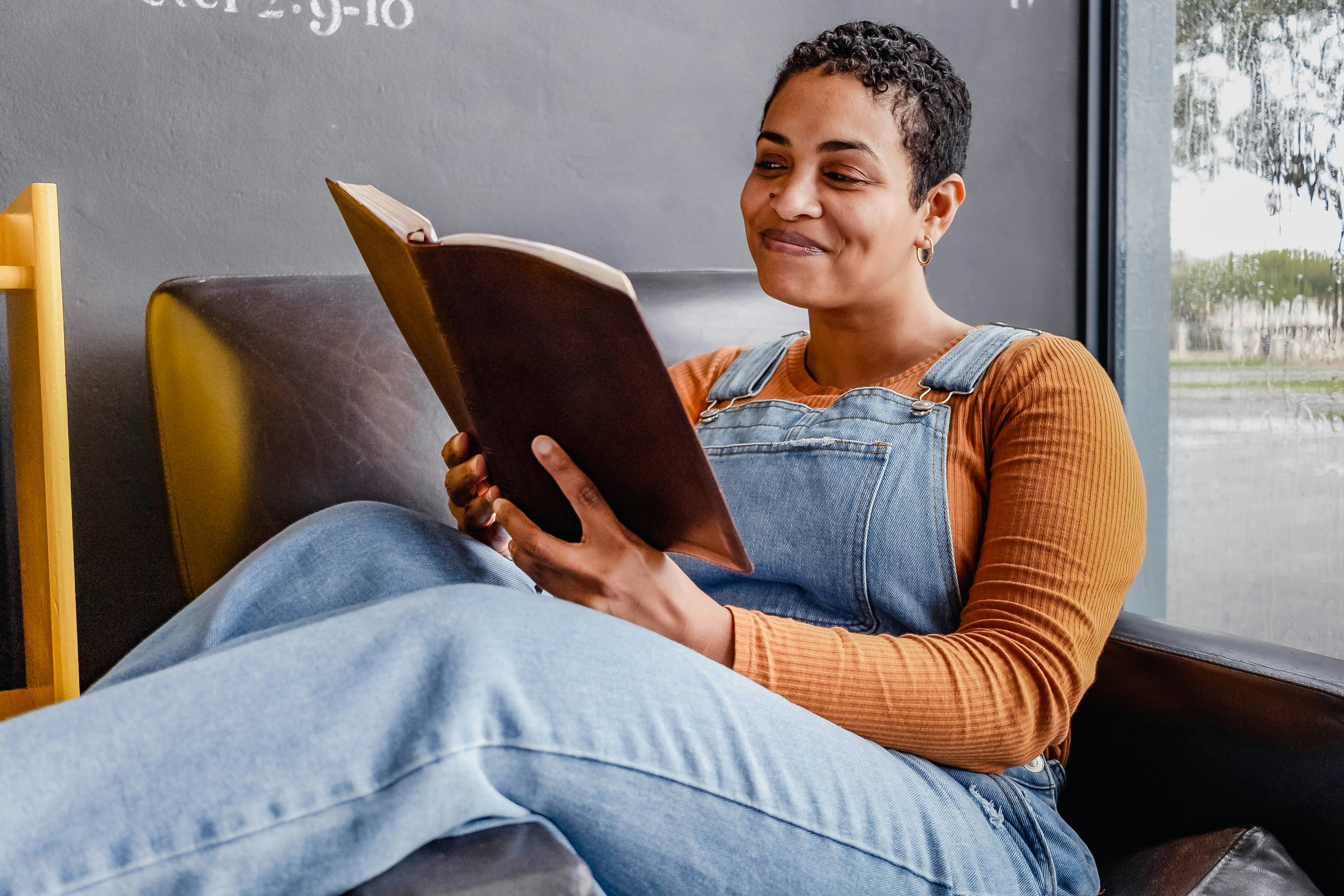 woman reading her journal
