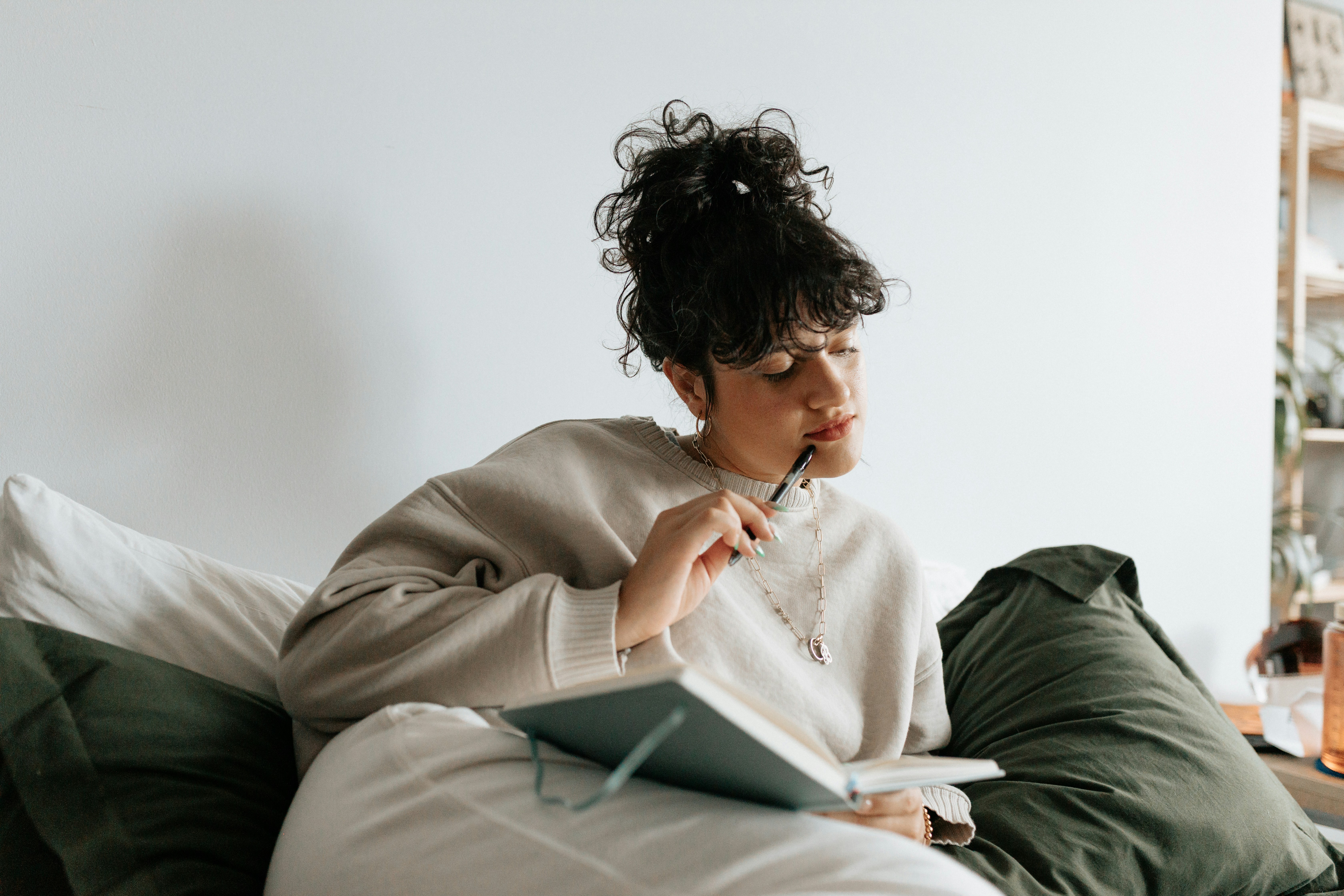 woman keeping a migraine diary