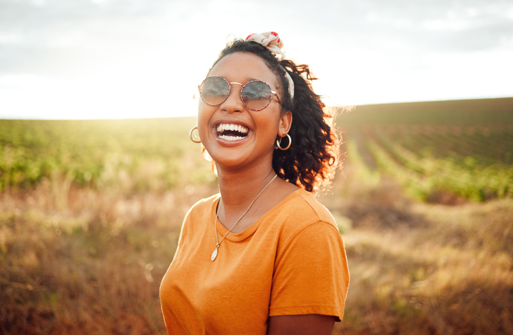joyful woman soaking up the sun