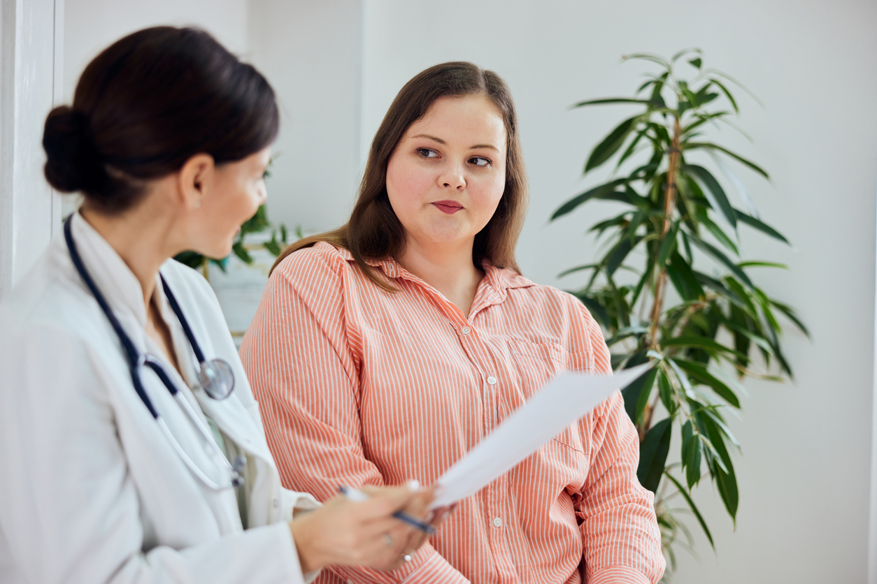 doctor discussing uterine fibroids with a patient