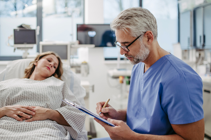 woman being treated in the hospital for kidney stones