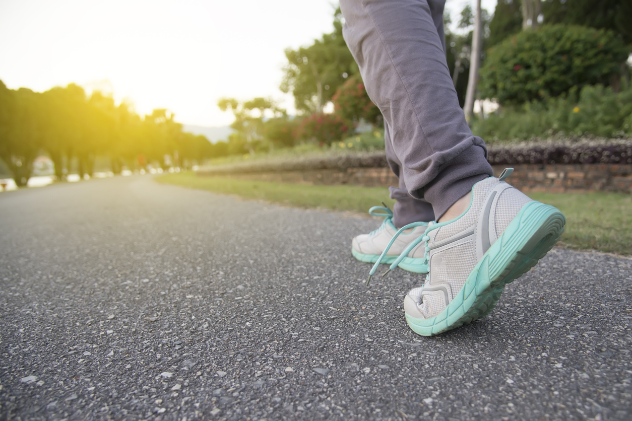 woman walking to prevent migraine