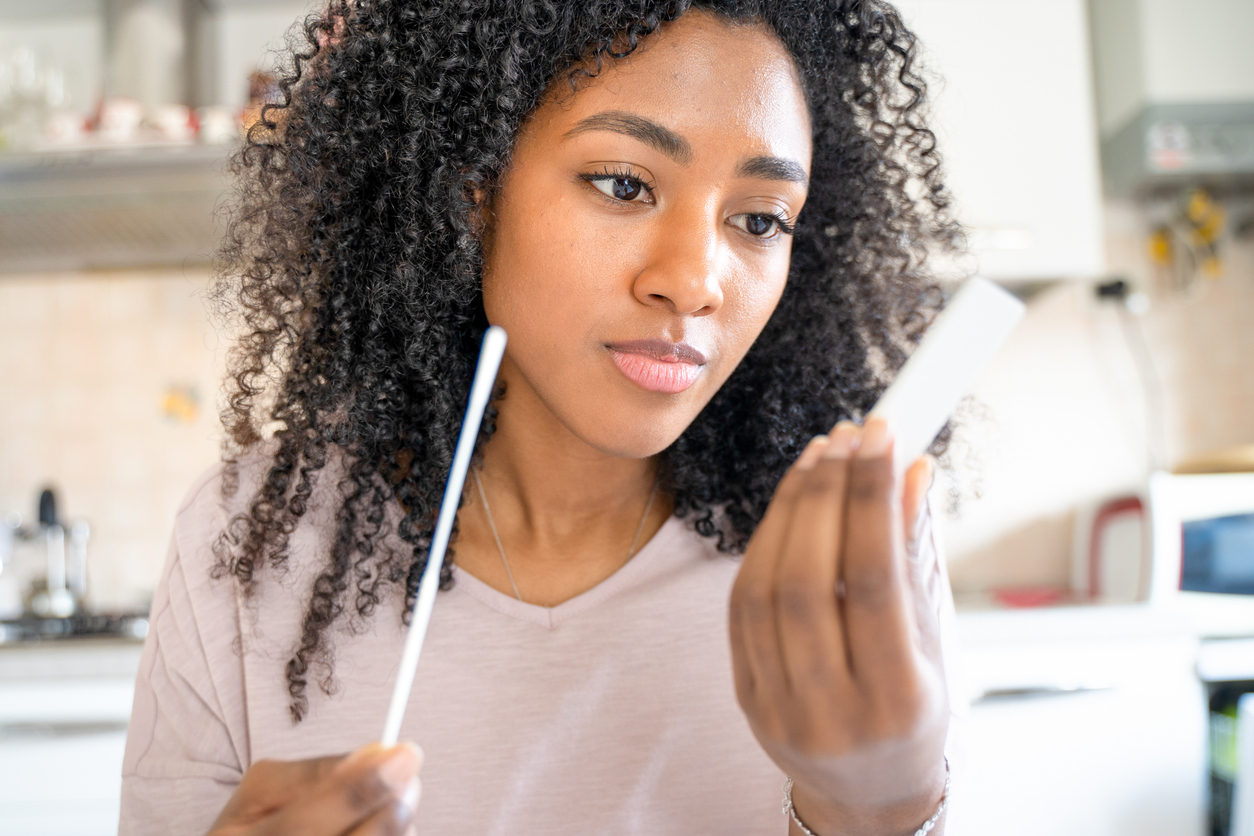 woman doing an at-home chlamydia test