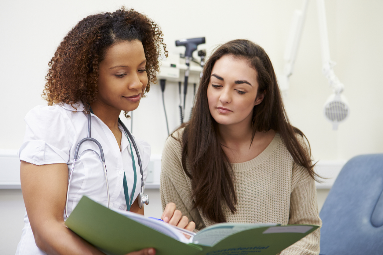 doctor discussing myreceptiva testing with her teen patient