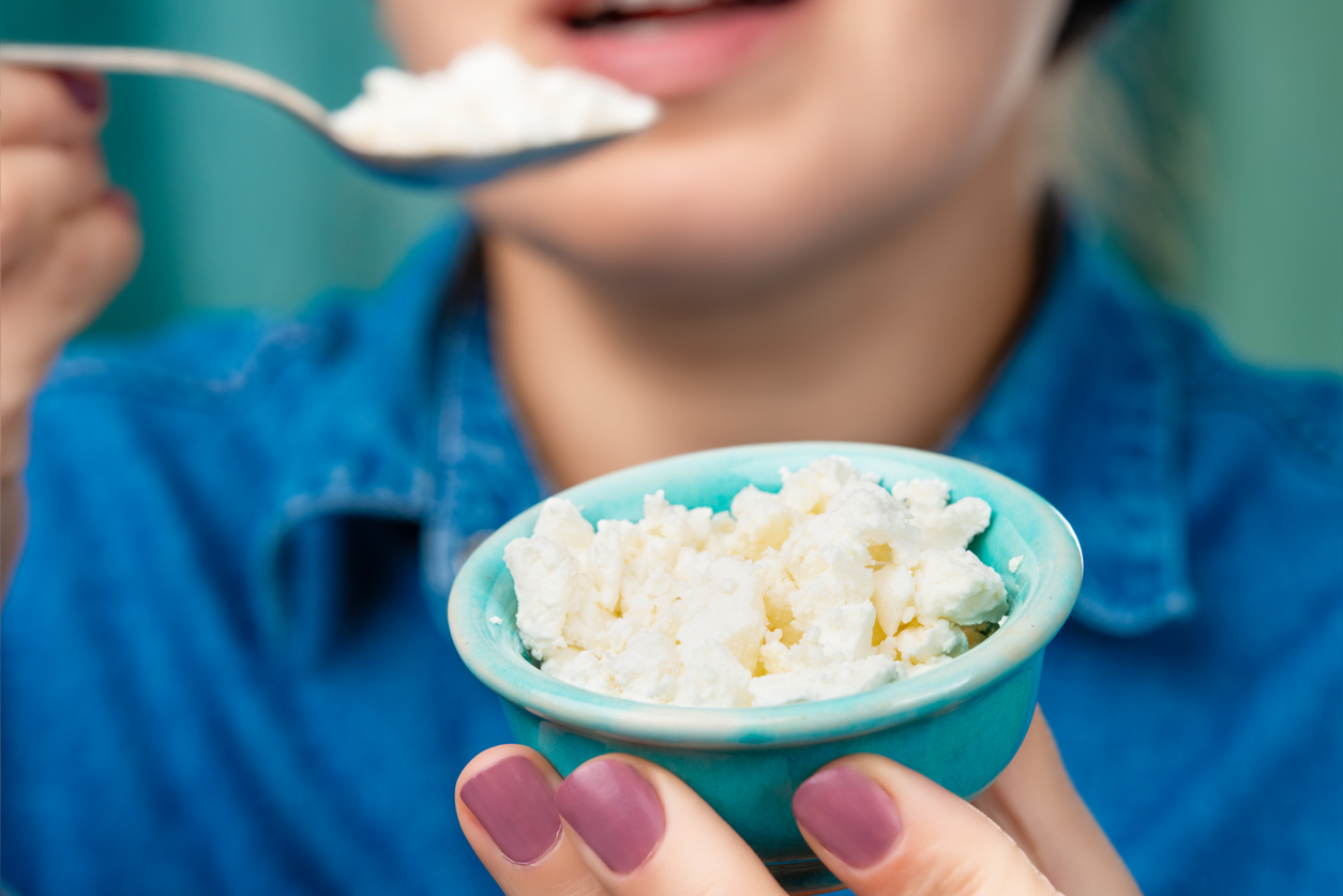 woman eating a cottage cheese "dessert"