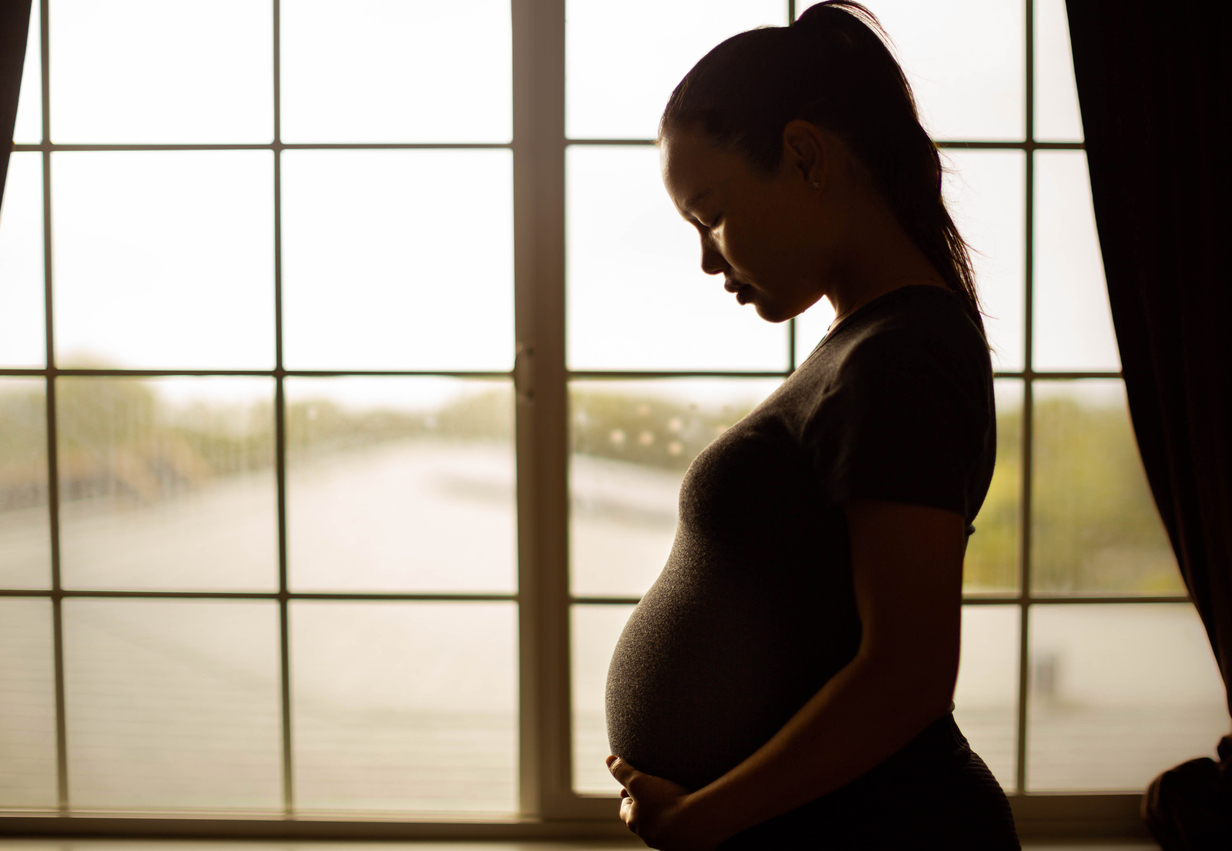 pregnant woman silhouetted
