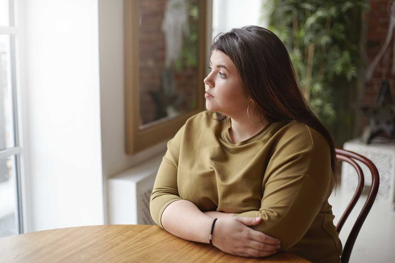 woman reflecting on ptsd and internalized trauma