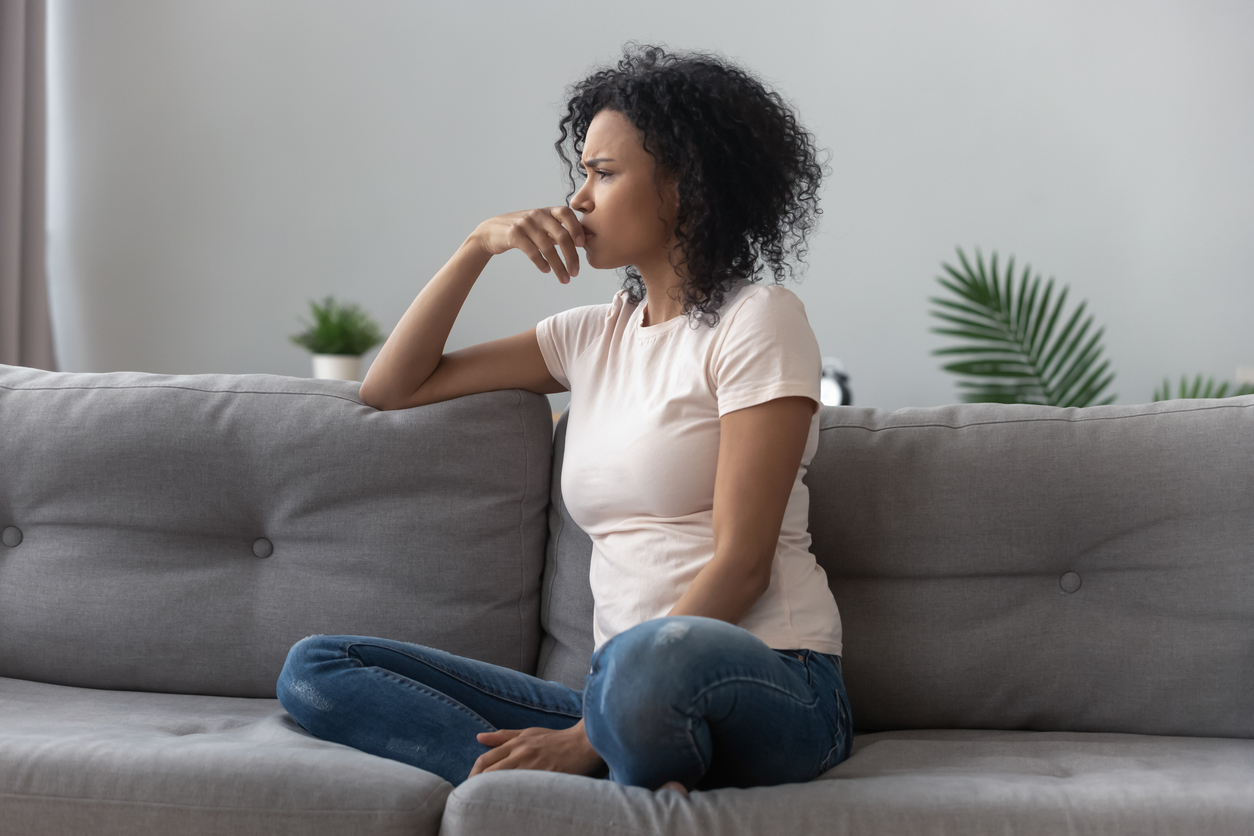 woman wondering why she got her period twice