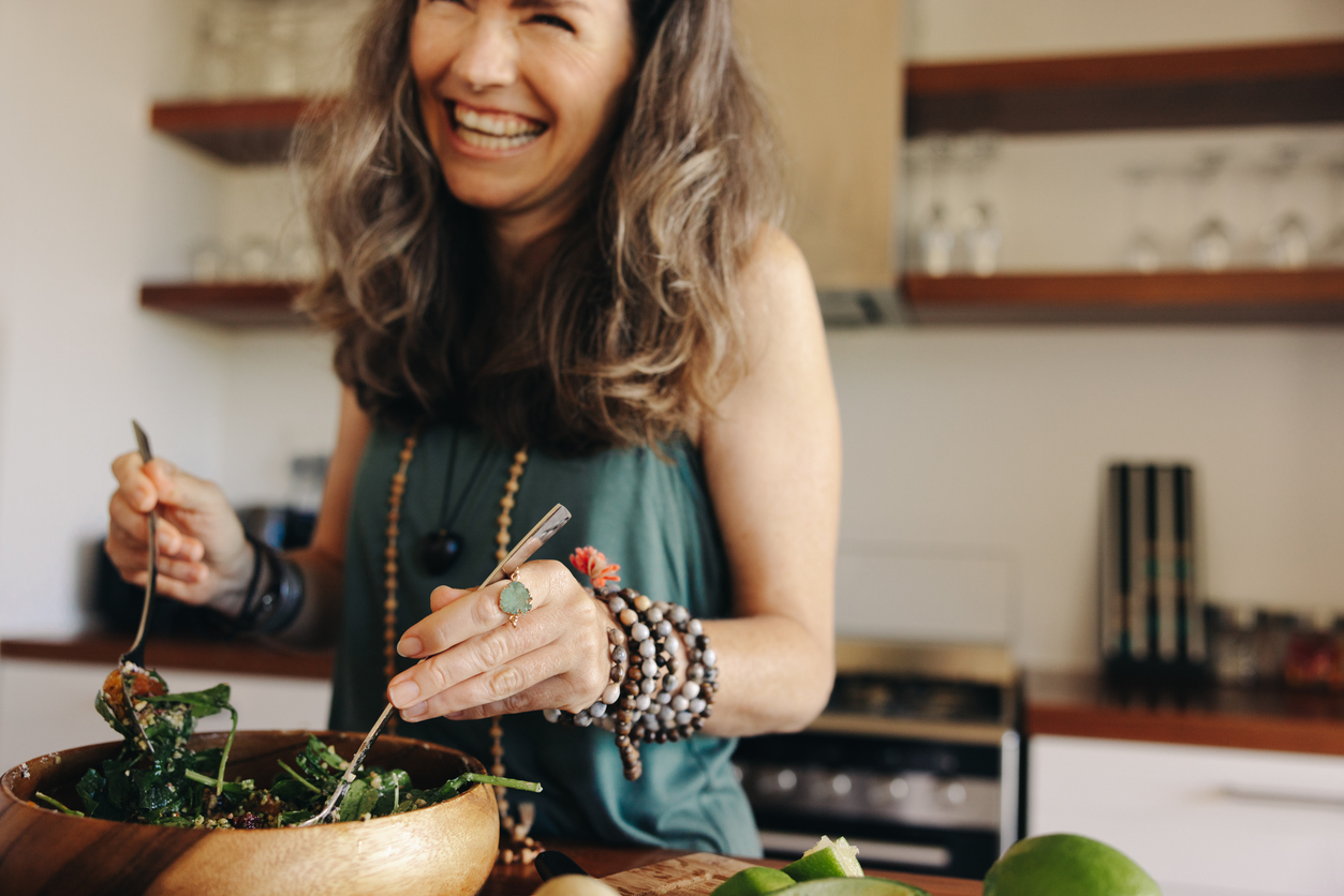 woman tossing a salad