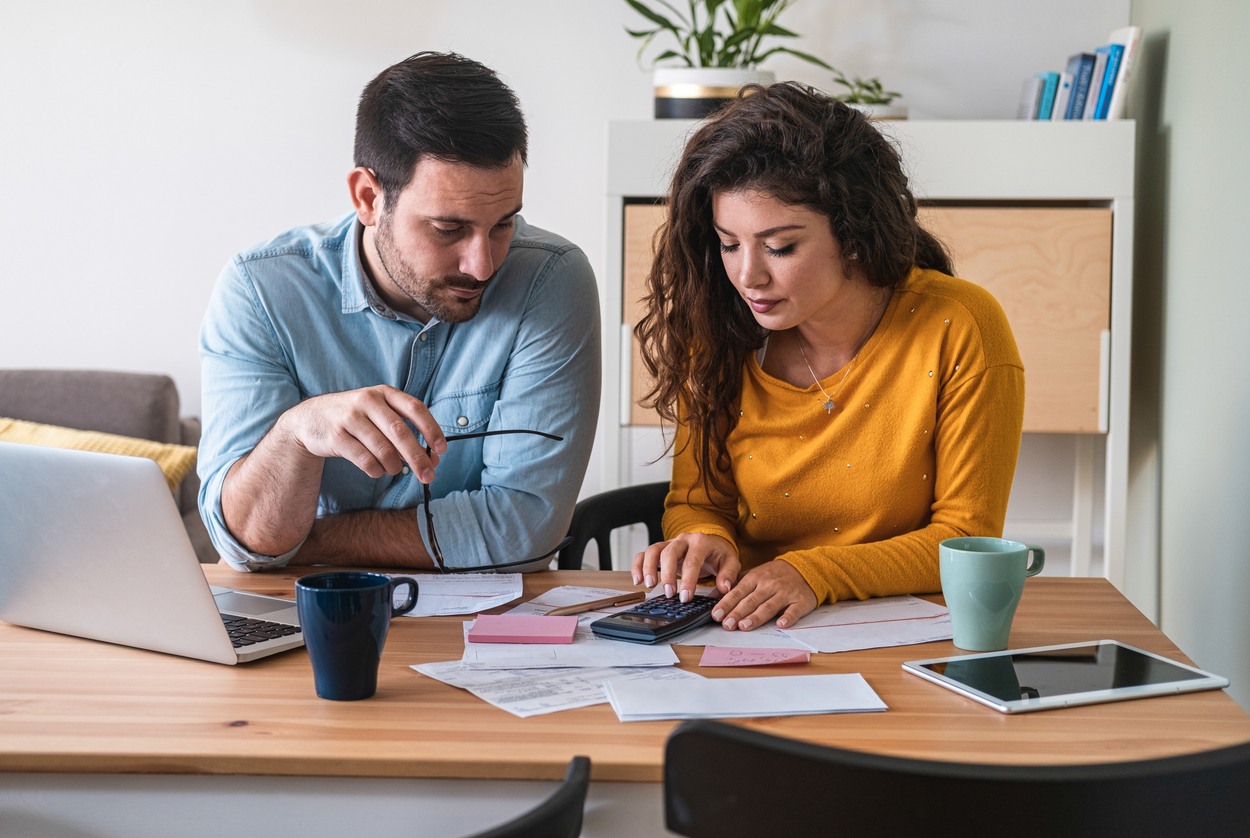 couple calculating how to finance ivf