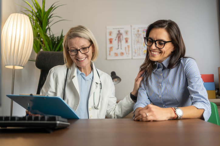 woman consulting with her gynecologist