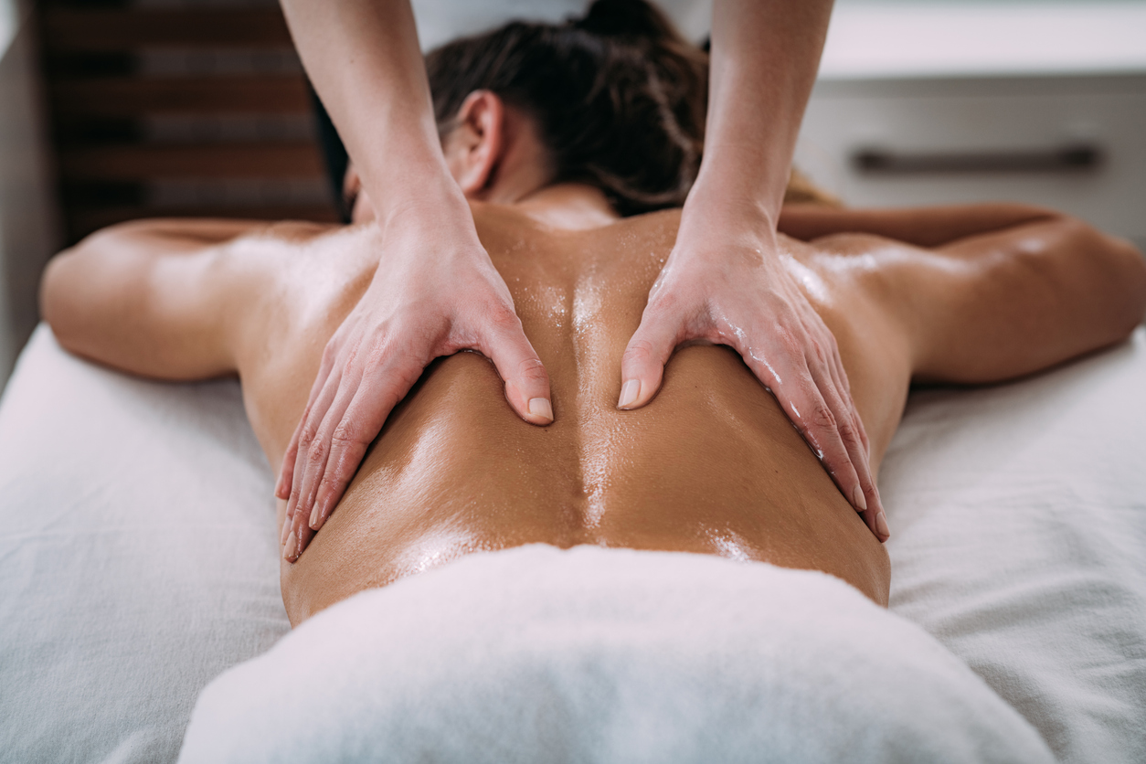 woman enjoying a fertility massage