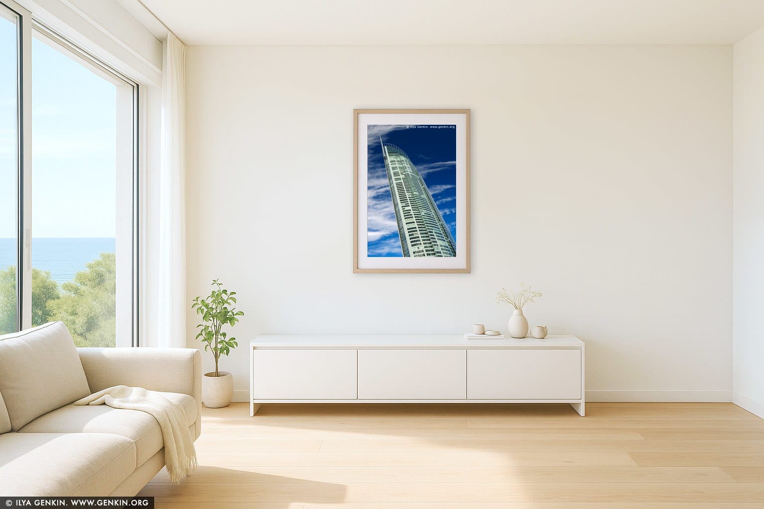 Skyward Elegance: Q1 Tower Against an Endless Blue wall art in a minimalist living room interior