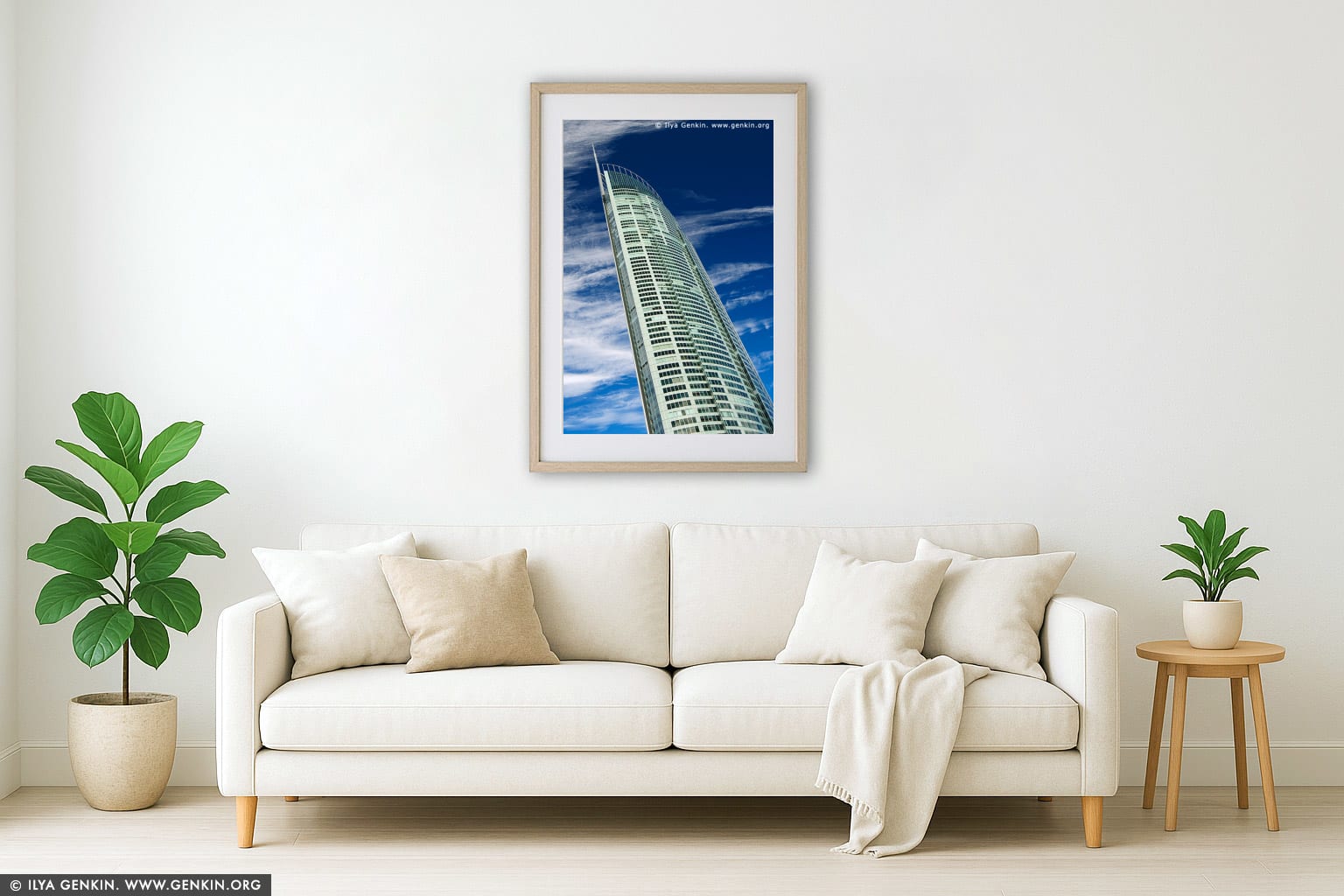 Skyward Elegance: Q1 Tower Against an Endless Blue wall art in a contemporary living room interior