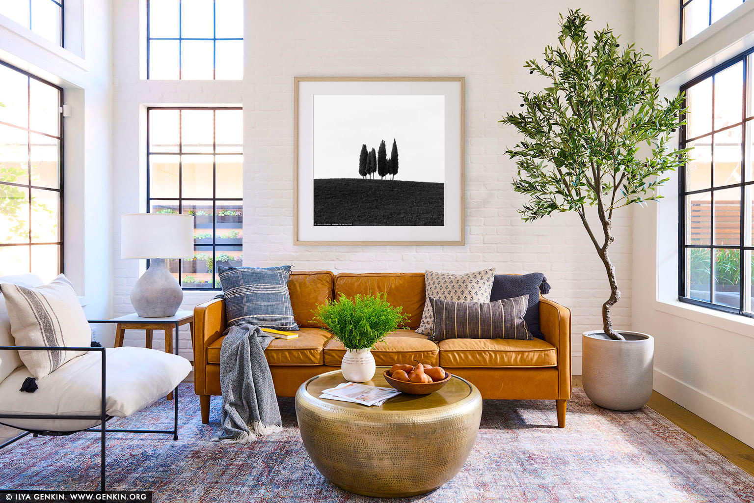 Solitude in Silhouette: Cypress Trees of San Quirico d'Orcia wall art in a contemporary living room interior