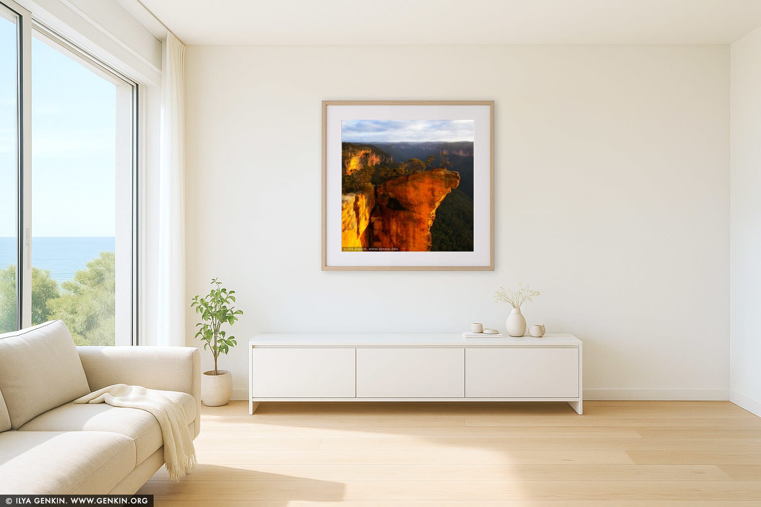 Hanging Rock at Sunrise wall art in a minimalist living room interior