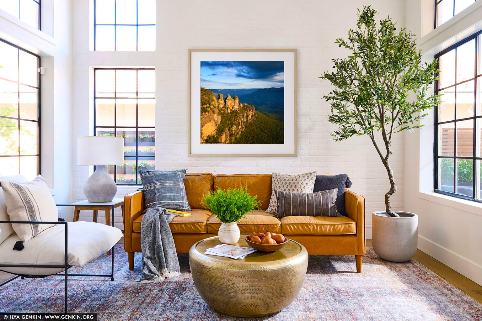 The Three Sisters wall art in a modern living room interior