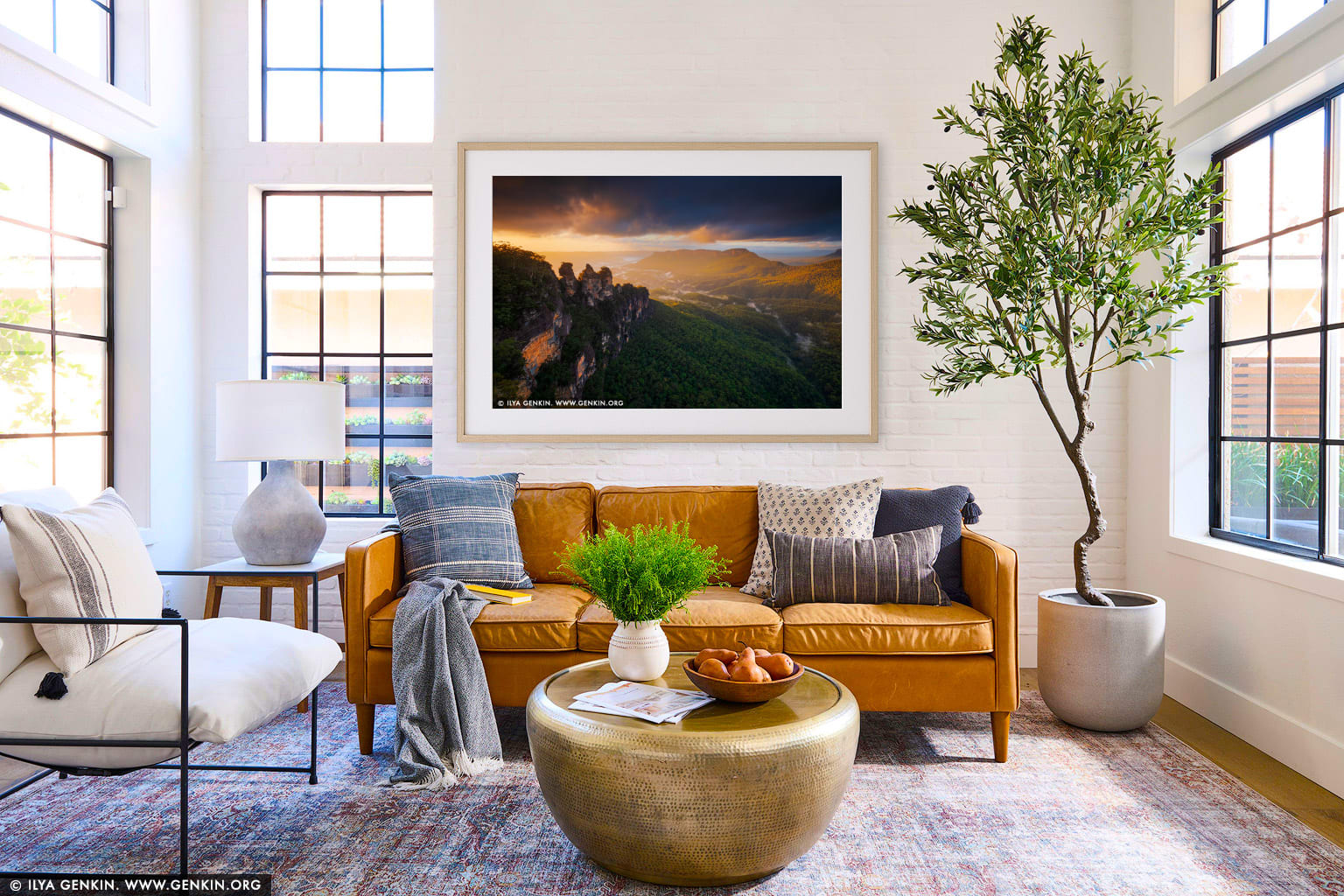 The Three Sisters at Dramatic Sunrise wall art in a minimalist living room interior