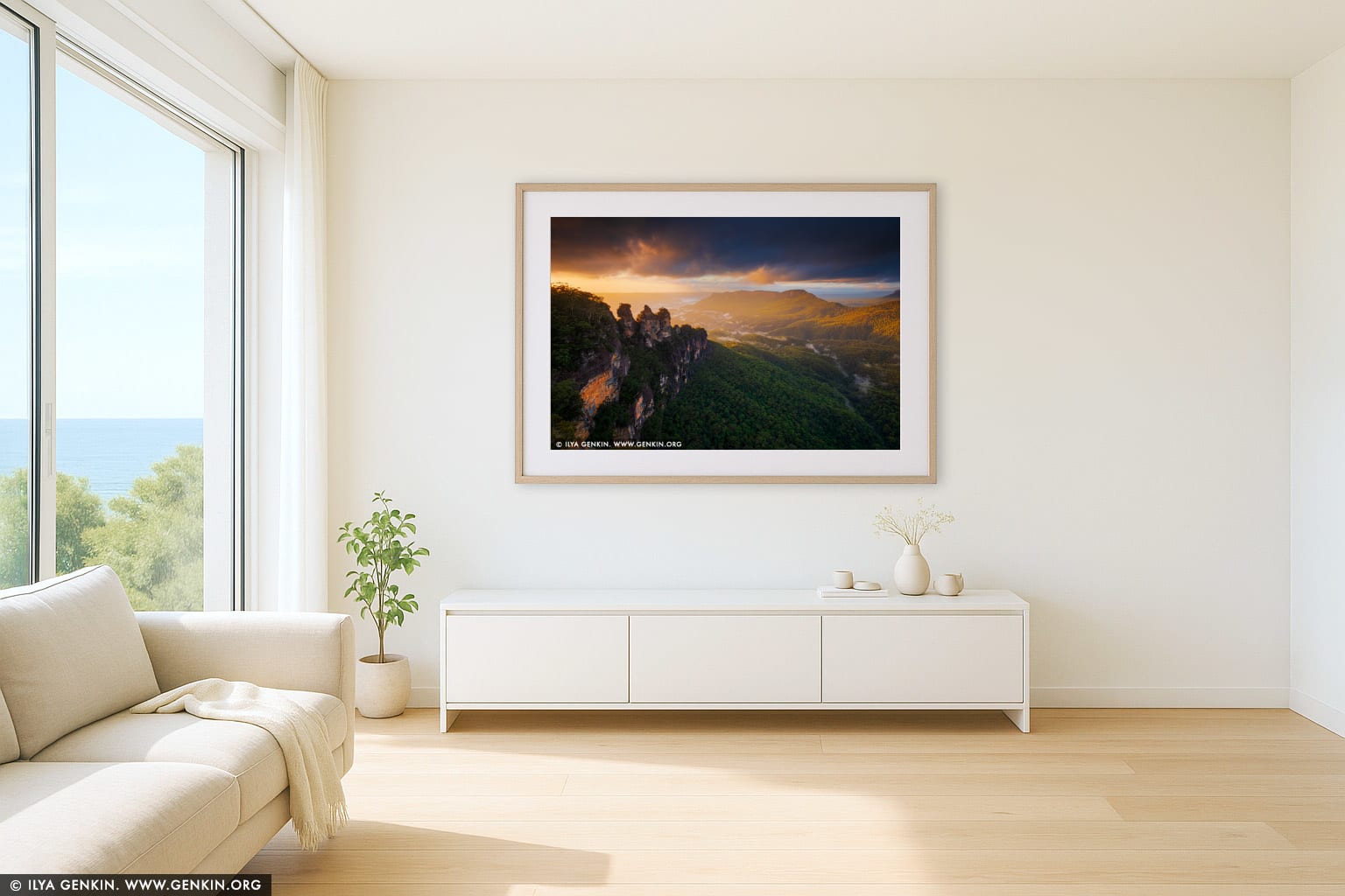 The Three Sisters at Dramatic Sunrise wall art in a minimalist living room interior