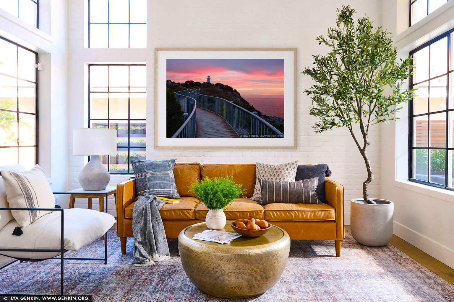 Sunrise at Cape Tourville Lighthouse wall art in a contemporary living room interior