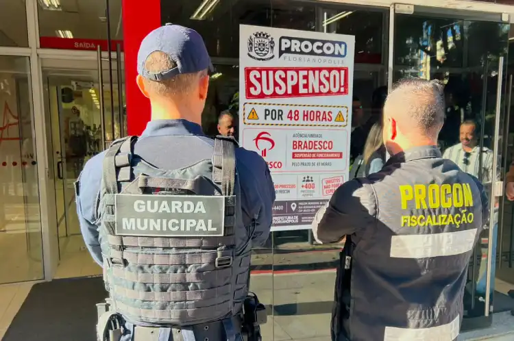 Procon interdita Bradesco de Florianópolis após centenas de reclamações; agência fecha por 48h e suspende novos contratos. Procon interdita Bradesco de Florianópolis após centenas de reclamações; agência fecha por 48h e suspende novos contratos.