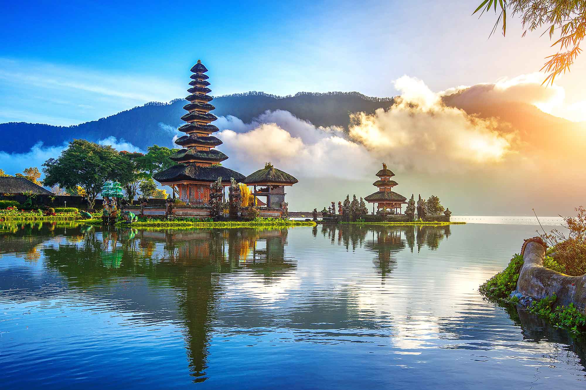 Ulun Danu Bratan temple reflected on a Bali lake at sunset